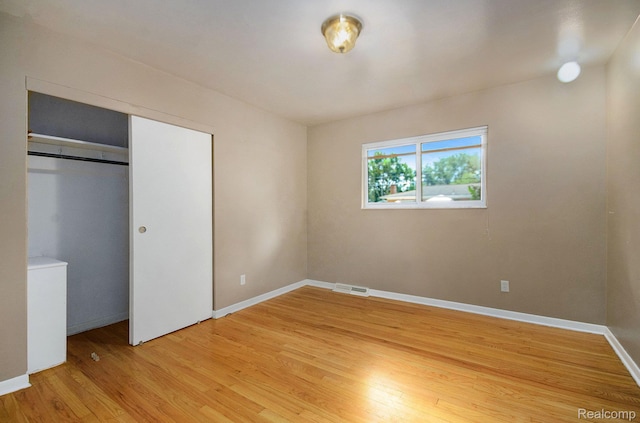 18319 Greenwald Dr, Southfield, MI 48075 - unfurnished bedroom featuring light wood-style flooring and a closet