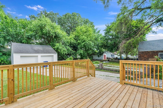 13356 Kilbourne St, Detroit, MI 48213 - wooden terrace with a detached garage, an outbuilding, and a yard