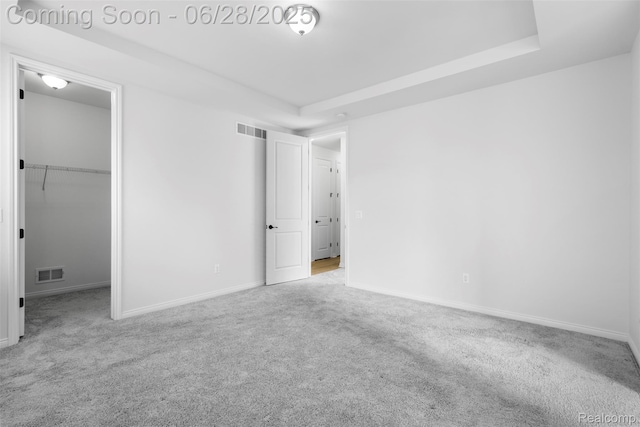 30493 Bradmore Rd, Warren, MI 48092 - unfurnished bedroom with carpet floors, a walk in closet, and a closet