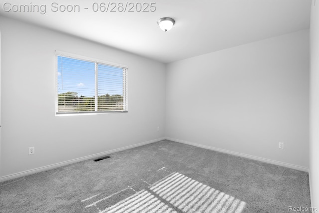 30493 Bradmore Rd, Warren, MI 48092 - carpeted empty room with baseboards