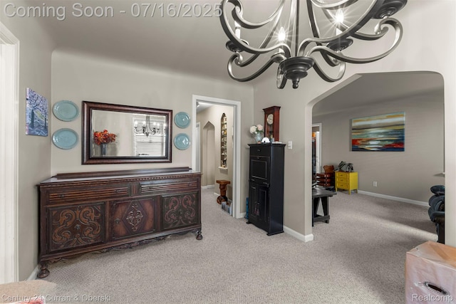 21280 Mada Ave, Southfield, MI 48075 - corridor featuring arched walkways, a chandelier, and carpet flooring