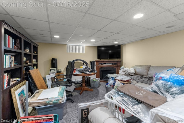 21280 Mada Ave, Southfield, MI 48075 - carpeted living area with a drop ceiling, recessed lighting, and a fireplace