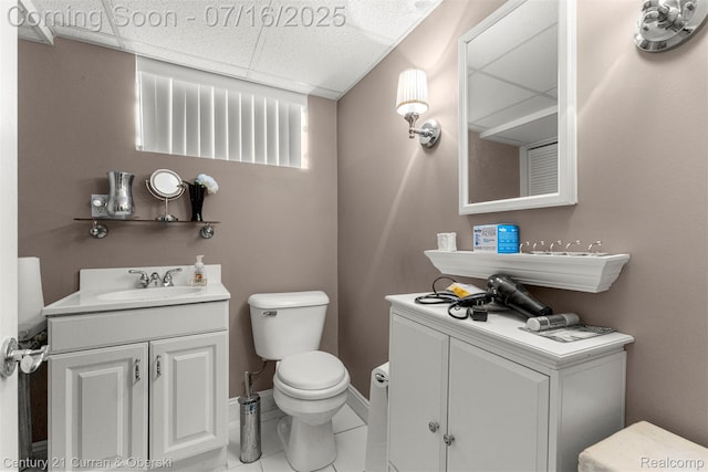 21280 Mada Ave, Southfield, MI 48075 - half bath with tile patterned floors, a drop ceiling, and vanity