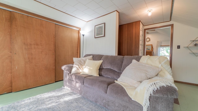 18216 S Schwark Rd, Three Oaks, MI 49128 - living room featuring vaulted ceiling and wooden walls