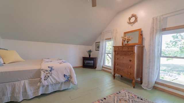 18216 S Schwark Rd, Three Oaks, MI 49128 - bedroom featuring lofted ceiling, light wood-style flooring, and multiple windows
