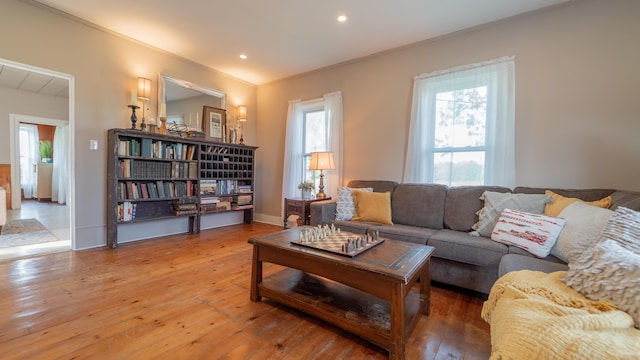 18216 S Schwark Rd, Three Oaks, MI 49128 - living room with plenty of natural light, hardwood / wood-style flooring, recessed lighting, and crown molding