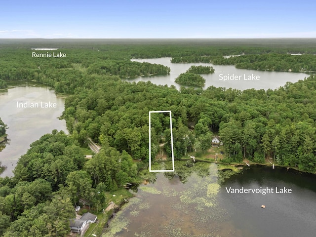 4382 S Vandervoight, Traverse City, MI 49696 - aerial view of property's location featuring a heavily wooded area and property parcel outlined
