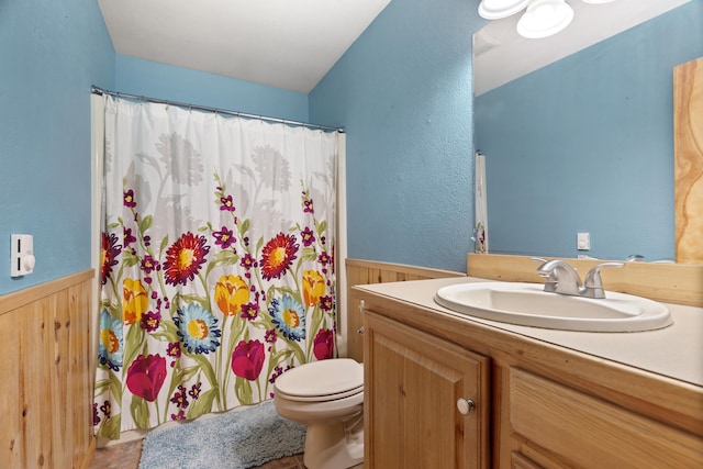 4382 S Vandervoight, Traverse City, MI 49696 - full bath with wainscoting, wooden walls, vanity, and a shower with curtain
