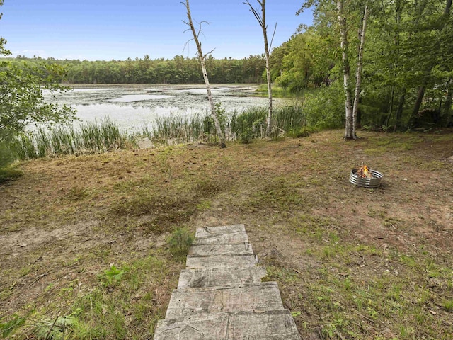 4382 S Vandervoight, Traverse City, MI 49696 - view of yard featuring a water view and a wooded view