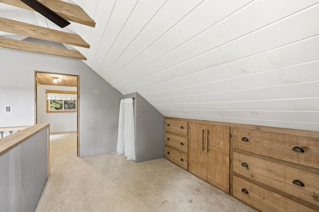 4382 S Vandervoight, Traverse City, MI 49696 - additional living space with lofted ceiling and light colored carpet