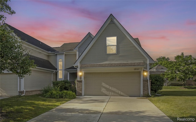 29719 Monterey Cir, Farmington, MI 48336 - view of front of home featuring a lawn and concrete driveway