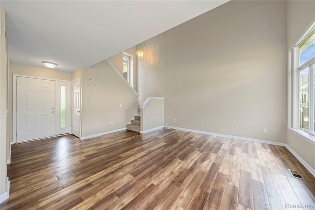 29719 Monterey Cir, Farmington, MI 48336 - foyer entrance featuring stairs and wood finished floors