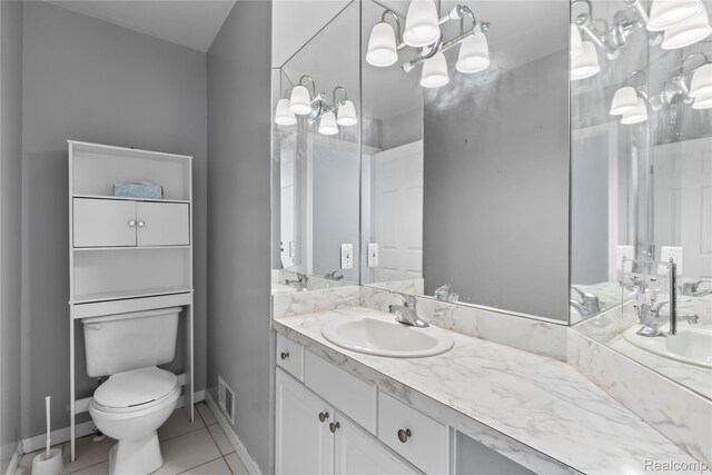 25893 Golf Pointe Dr, Southfield, MI 48075 - bathroom featuring vanity, tile patterned floors, and a chandelier