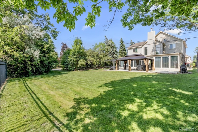 25893 Golf Pointe Dr, Southfield, MI 48075 - view of green lawn with a gazebo and a patio