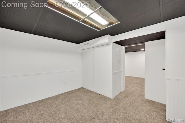 2190 Crescent Lake Rd, Holly, MI 48329 - finished below grade area featuring carpet flooring and a paneled ceiling