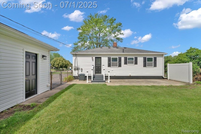 2190 Crescent Lake Rd, Holly, MI 48329 - back of house with a patio area and a chimney