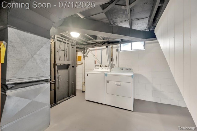 2190 Crescent Lake Rd, Holly, MI 48329 - below grade area with independent washer and dryer, concrete block wall, and heating unit