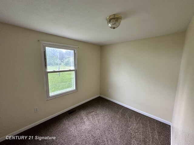 2252 N M-18 Rd, Beaverton, MI 48612 - empty room with carpet and baseboards