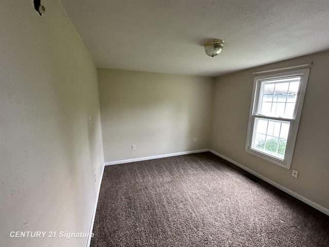 2252 N M-18 Rd, Beaverton, MI 48612 - unfurnished room with carpet and baseboards