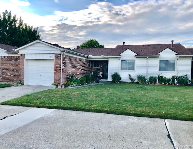 8681 Tucson Ct, Warren, MI 48093 - ranch-style house featuring a front yard, concrete driveway, an attached garage, and brick siding
