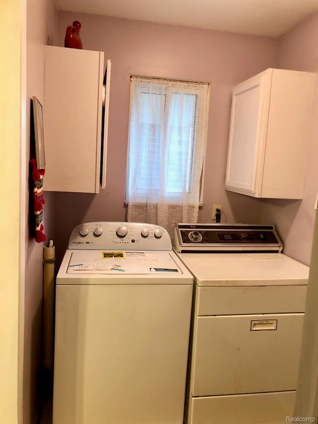 8681 Tucson Ct, Warren, MI 48093 - washroom featuring cabinet space and washer and dryer