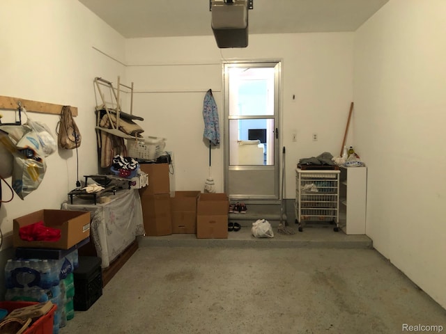 8681 Tucson Ct, Warren, MI 48093 - garage featuring a garage door opener