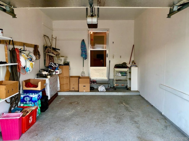 8681 Tucson Ct, Warren, MI 48093 - garage featuring a garage door opener