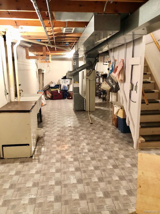 8681 Tucson Ct, Warren, MI 48093 - unfinished below grade area featuring stairway