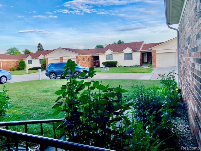 8681 Tucson Ct, Warren, MI 48093 - view of grassy yard with concrete driveway