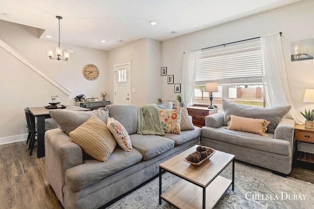 611 Bedford Falls Dr, Sparta, MI 49345 - living area featuring wood finished floors, a chandelier, plenty of natural light, and recessed lighting