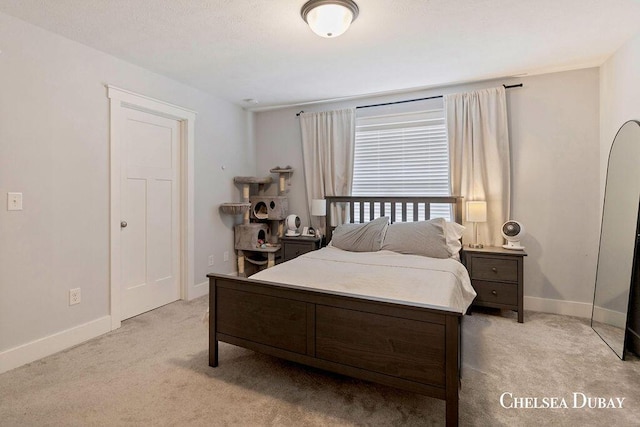 611 Bedford Falls Dr, Sparta, MI 49345 - bedroom featuring light colored carpet and baseboards