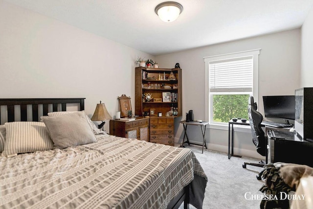 611 Bedford Falls Dr, Sparta, MI 49345 - bedroom with carpet floors and a desk