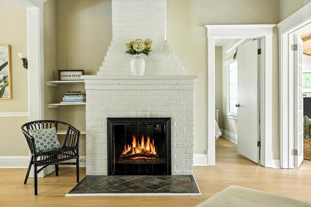 46210 Perkins Blvd, New Buffalo, MI 49117 - detailed view of a fireplace and wood finished floors