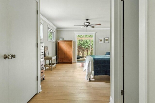 46210 Perkins Blvd, New Buffalo, MI 49117 - bedroom featuring crown molding, access to exterior, light wood-style floors, and a ceiling fan