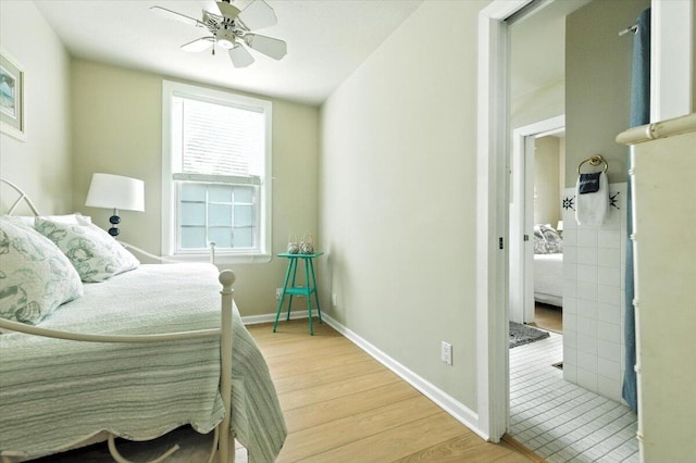 46210 Perkins Blvd, New Buffalo, MI 49117 - bedroom featuring light wood-style flooring and a ceiling fan
