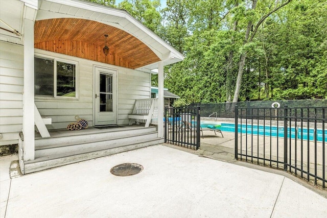46210 Perkins Blvd, New Buffalo, MI 49117 - view of patio / terrace with view of wooded area