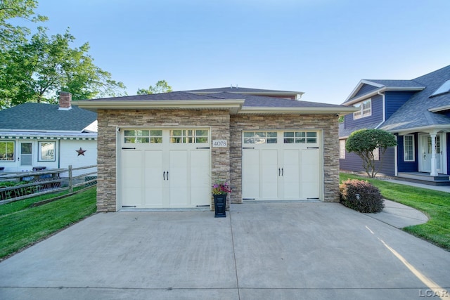 4078 Woodland Ave, Manitou Beach, MI 49253 - garage featuring concrete driveway