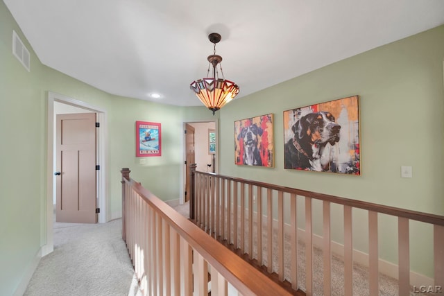 4078 Woodland Ave, Manitou Beach, MI 49253 - hallway with an upstairs landing, carpet, and recessed lighting