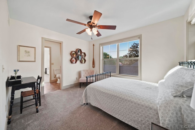 4078 Woodland Ave, Manitou Beach, MI 49253 - bedroom with carpet floors, ceiling fan, and ensuite bathroom