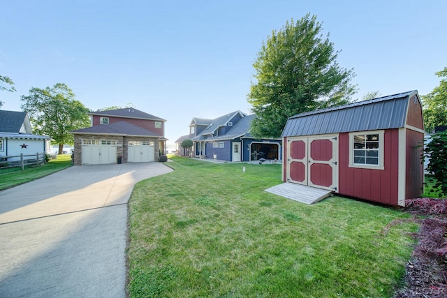 4078 Woodland Ave, Manitou Beach, MI 49253 - view of green lawn featuring a storage unit