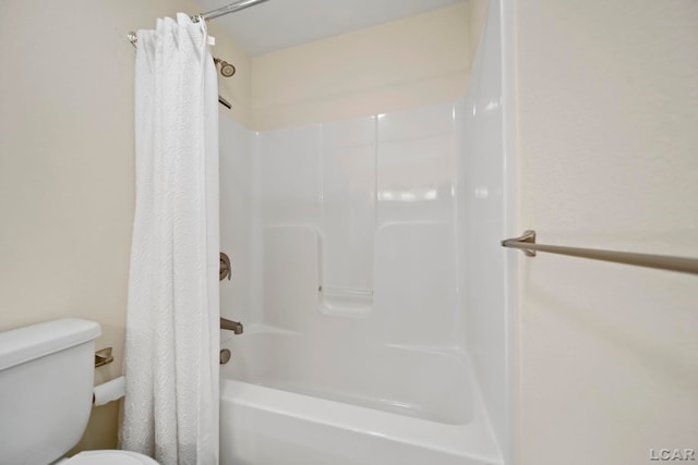 4078 Woodland Ave, Manitou Beach, MI 49253 - bathroom featuring toilet and shower / tub combo