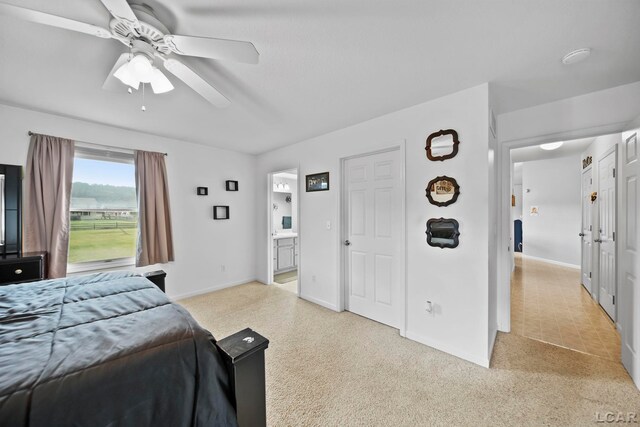 2099 Friar Tuck Cir, Adrian, MI 49221 - bedroom featuring ensuite bathroom and a ceiling fan