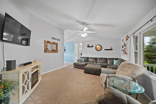 2099 Friar Tuck Cir, Adrian, MI 49221 - carpeted living room featuring vaulted ceiling and ceiling fan