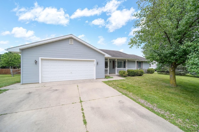 2099 Friar Tuck Cir, Adrian, MI 49221 - ranch-style home featuring a front lawn, a porch, an attached garage, and concrete driveway