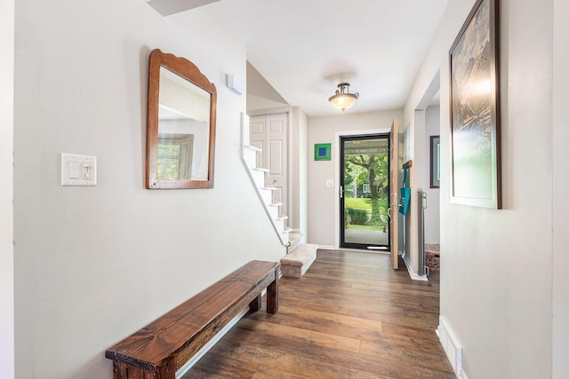 2211 Skyline Dr NW, Grand Rapids, MI 49504 - entryway with dark wood-style floors and stairway