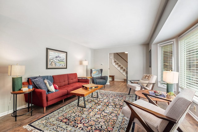 2211 Skyline Dr NW, Grand Rapids, MI 49504 - living room with stairway and wood finished floors