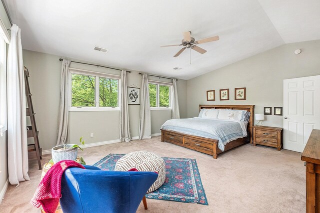 2211 Skyline Dr NW, Grand Rapids, MI 49504 - carpeted bedroom featuring lofted ceiling and ceiling fan