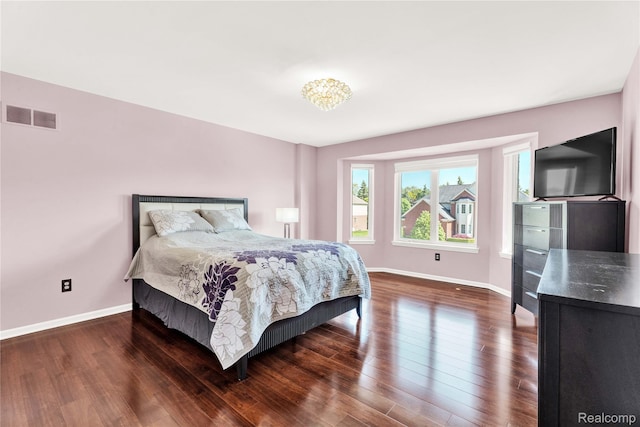 4303 S Lake Ln, Shelby Twp, MI 48316 - bedroom with baseboards and wood finished floors