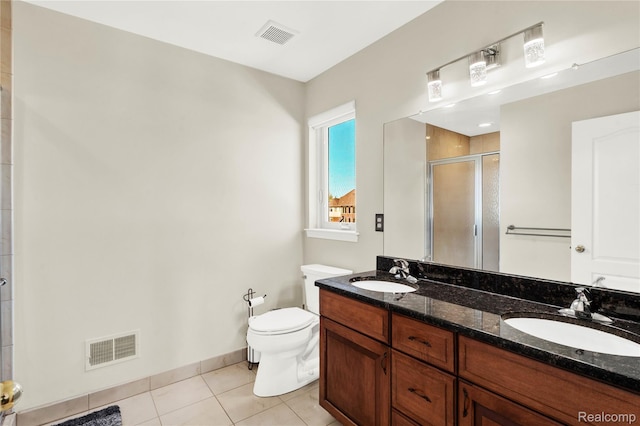 4303 S Lake Ln, Shelby Twp, MI 48316 - bathroom with tile patterned floors, a stall shower, and double vanity