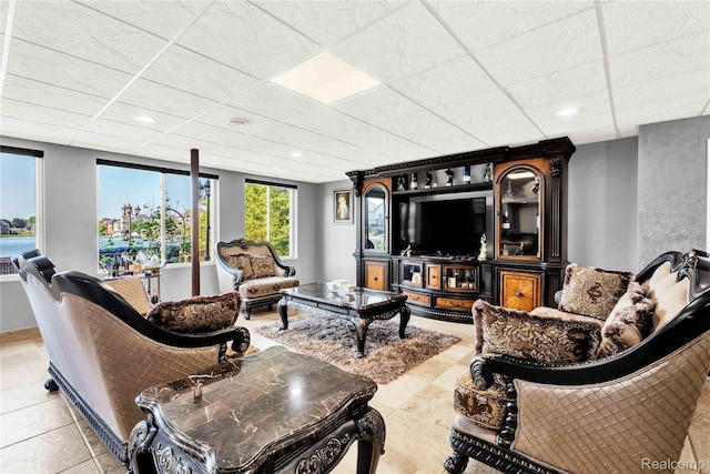 4303 S Lake Ln, Shelby Twp, MI 48316 - living room featuring recessed lighting, tile patterned floors, and a paneled ceiling